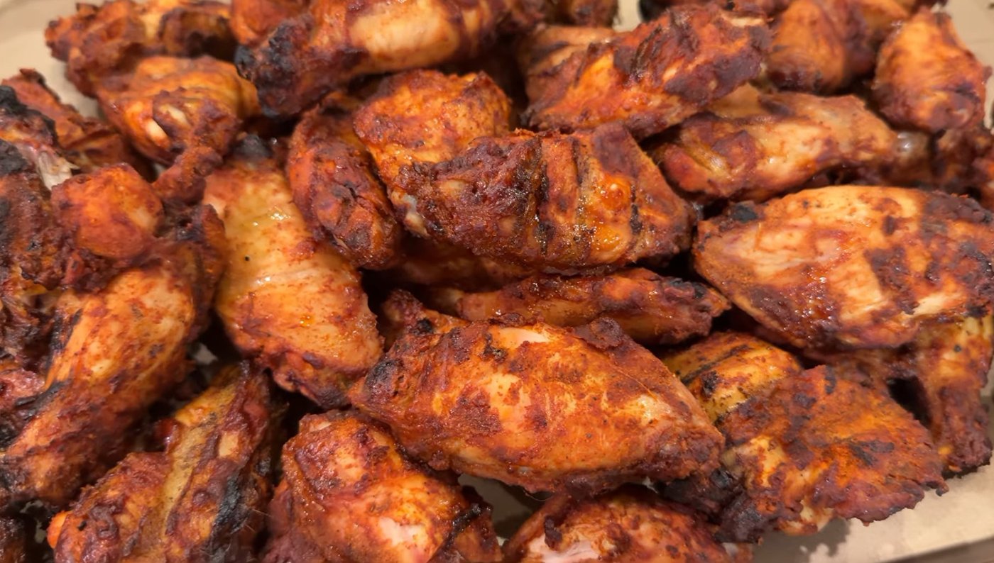 A pile of smoked dry-rub buffalo wings